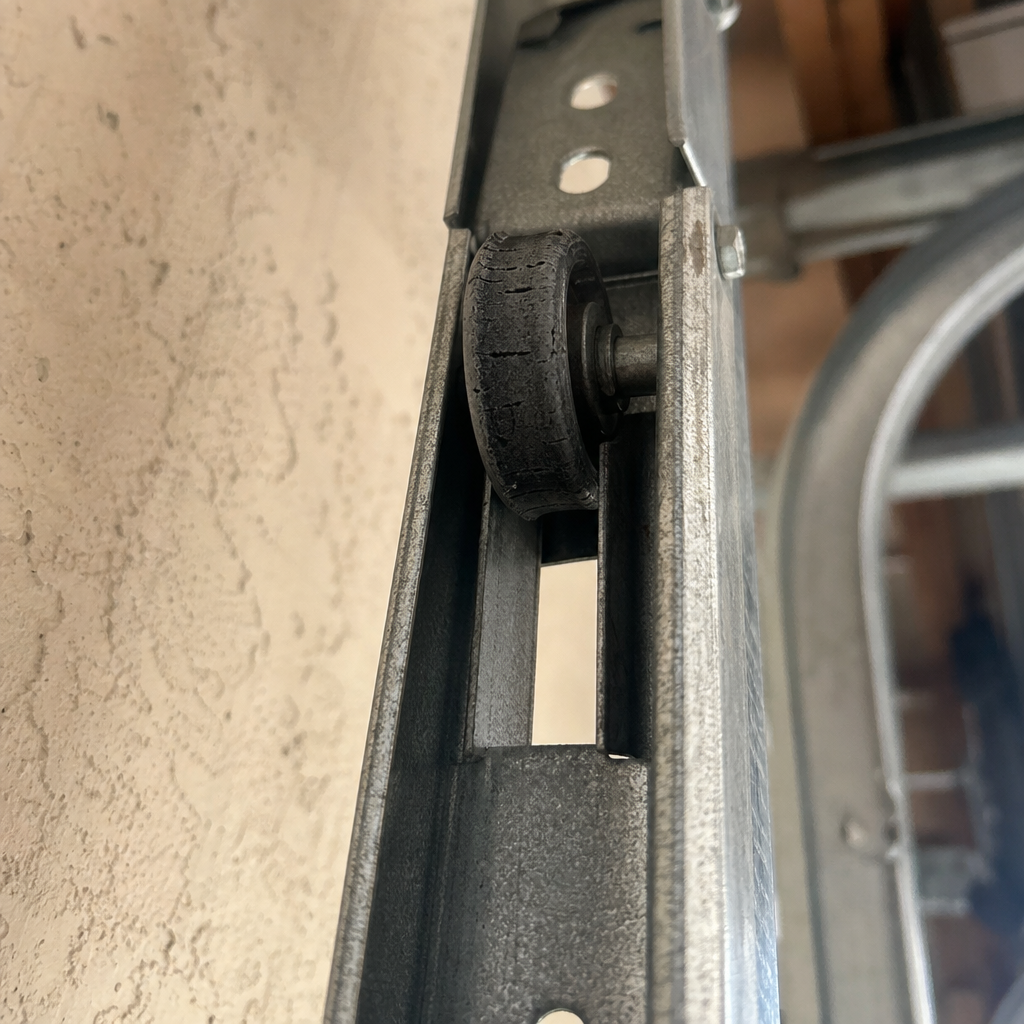 Illustration for garage door roller repair in Cutler